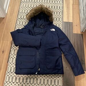 The North Face Girls size 14/16 navy winter coat. Excellent condition
